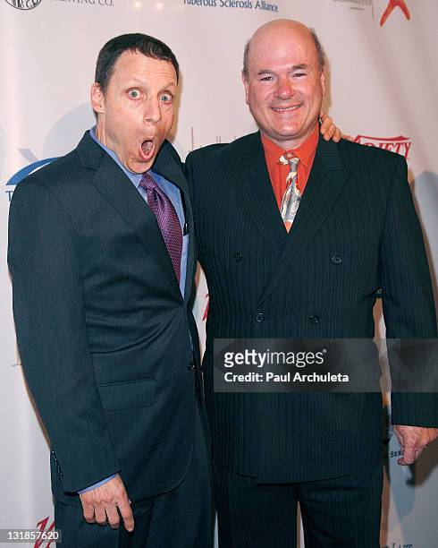 Comedians Mark Schiff and Larry Miller arrive at the10th annual Comedy For A Cure at The Roosevelt Hotel on April 3, 2011 in Hollywood, California.