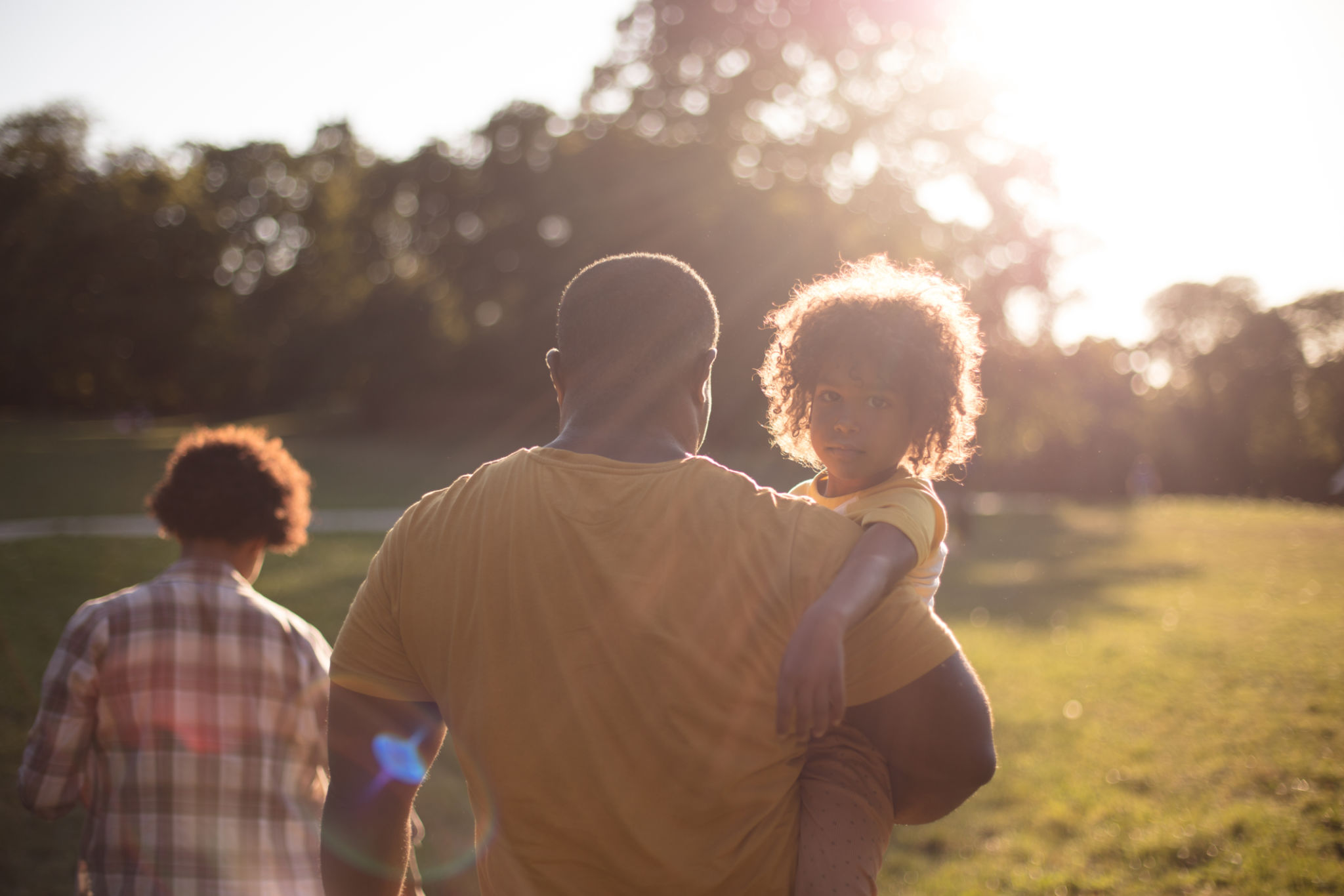 African American family in nature. Walk with mom and dad. African American family in nature. Walk with mom and dad.