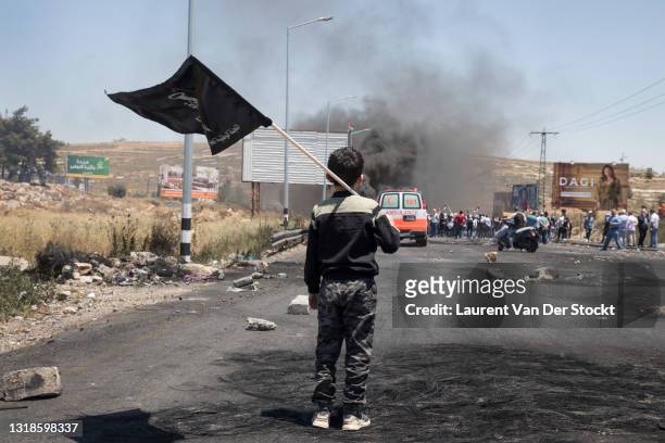 Protesters demonstrate on Nakba Day, which marks the mass displacement of Palestinians during the creation of modern Israel in 1948, on May 15, 2021...
