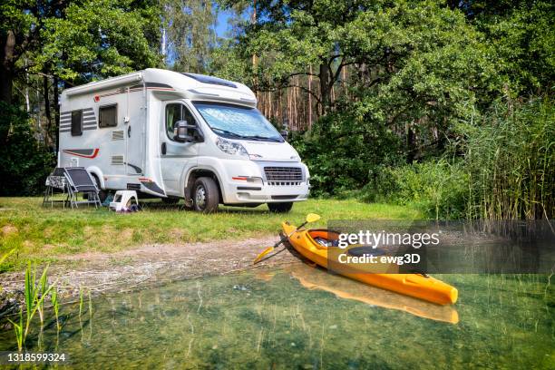 holidays in germany - summer recreation at the lake - camping trailer stock pictures, royalty-free photos & images