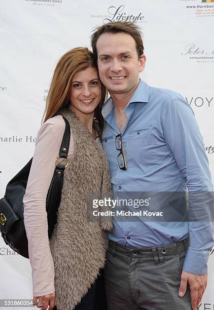 Laura Putnam and Michael Dean Shelton attend the 2010 Beverly Hills Fashion Fair - Arrivals on November 6, 2010 in Los Angeles, California.