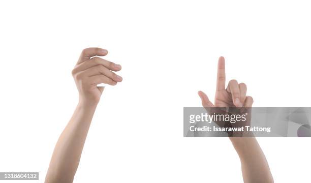 one hand gestures holding something and the other hand pointing isolated on white background - menschlicher arm stock-fotos und bilder