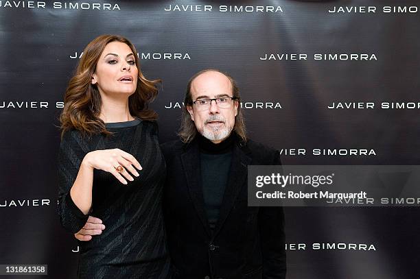 Fashion designer Javier Simorra and Maria Jose Suarez attend the 'Javier Simorra' store opening at the Pedrables Center on November 18, 2010 in...