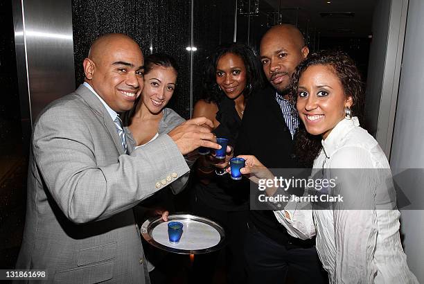 Guests toast to DJ D-Nice at a Hennessey Black party to celebrate DJ D-Nice signing to Roc Nation DJ's at The Cooper Square Hotel on November 16,...