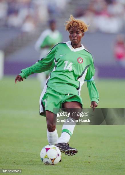 Florence Omagbemi, Captain and Midfielder for Nigeria passes the football during the Group A match of the FIFA Women's World Cup against North Korea...