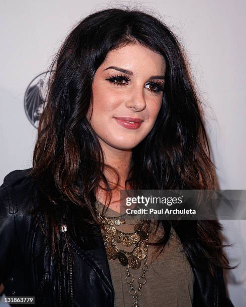 Actress Shenae Grimes arrives at the10th annual Comedy For A Cure at The Roosevelt Hotel on April 3, 2011 in Hollywood, California.