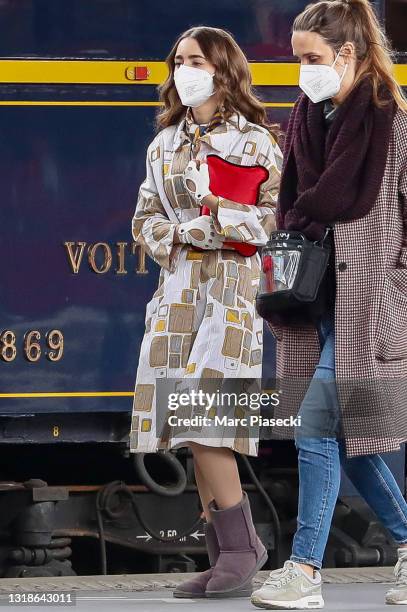 Actress Lily Collins is seen on the set of 'Emily in Paris Season II' on May 18, 2021 in Paris, France.