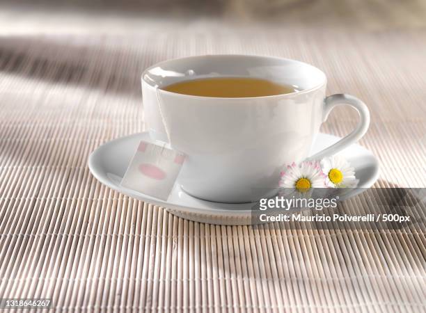 close-up of coffee cup on table,rimini,italy - chamomile tea stock pictures, royalty-free photos & images