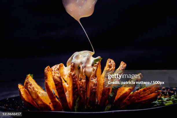 close-up of food in plate on table,argentina - aioli stock-fotos und bilder