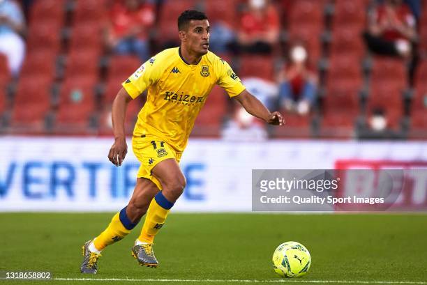 Victor Garcia of Alcorcon with the ball during the Liga Smartbank match betwen RCD Mallorca and AD Alcorcon at Estadi de Son Moix on May 16, 2021 in...