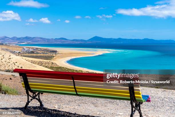 bench with view to the sea, mirador del salmo, fuerteventura - fuerteventura fotografías e imágenes de stock