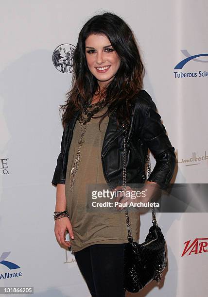 Actress Shenae Grimes arrives at the10th annual Comedy For A Cure at The Roosevelt Hotel on April 3, 2011 in Hollywood, California.