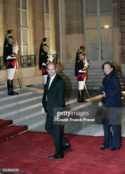 French Labor Minister Eric Woerth arrives with his wife Florence Woerth arrives at a state dinner honouring visiting Chinese President Hu Jintao at...