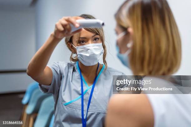 Nurses Fever 657 Nurse Temperature Check Stock Photos, High-Res Pictures, and Images ...