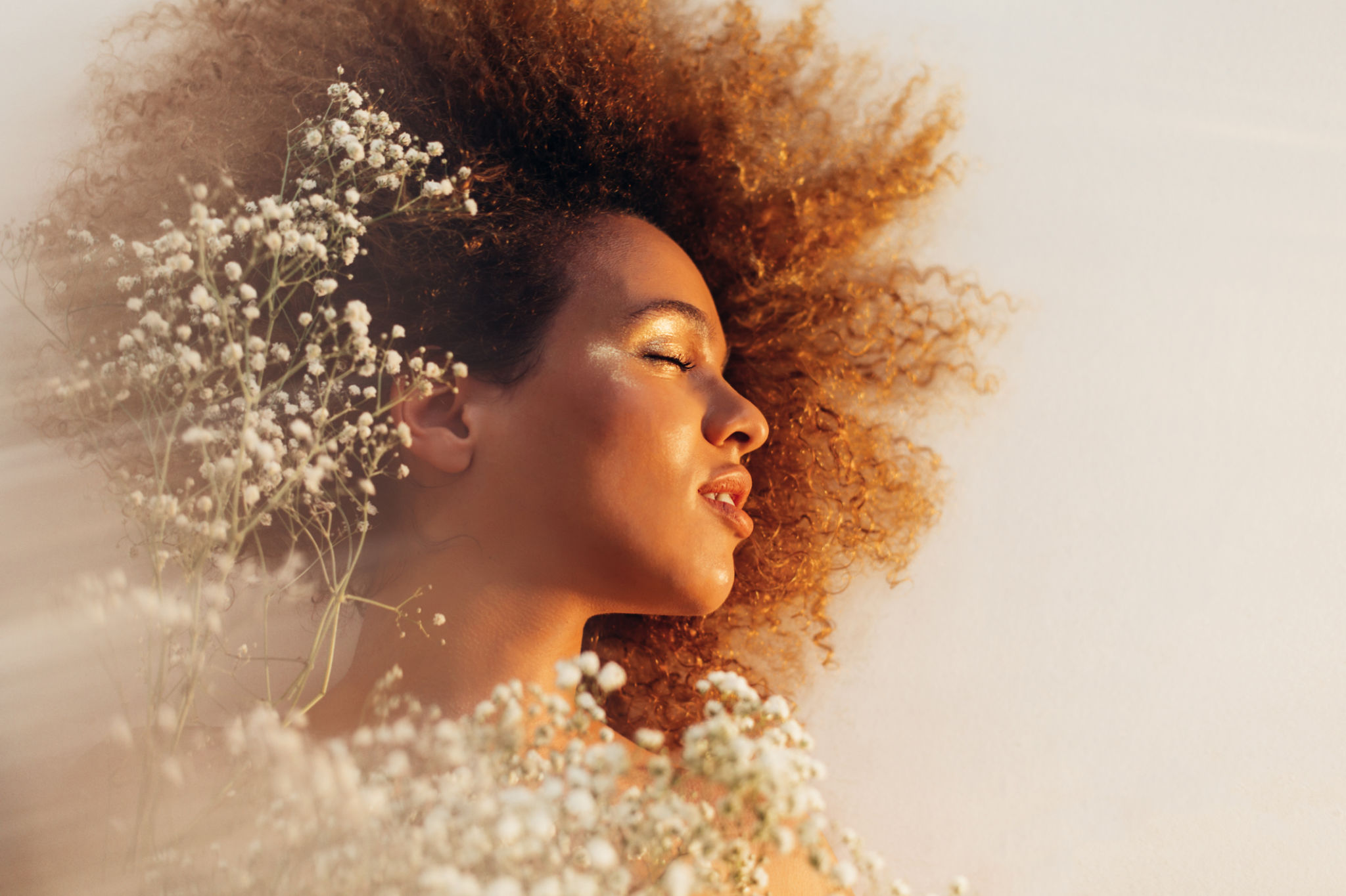 Portrait of a beautiful woman in white hyposphila flowers. Portrait of a beautiful woman in white hyposphila flowers.