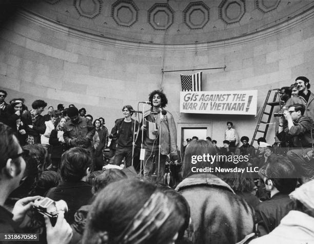 Yippie leader Abbie Hoffman talks to assembled peace marchers at bandshell in Central Park in Manhattan during peace rally on April 5, 1969.