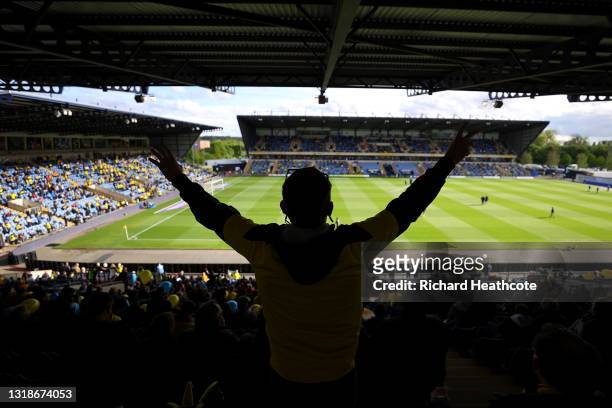 An Oxford United fan shows their support from their seat inside of the stadium ahead of the Sky Bet League One Play-off Semi Final 1st Leg match...