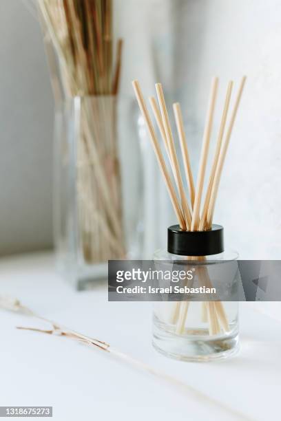 close up of a homemade air freshener with essencean on white background. - air freshener stockfoto's en -beelden