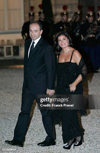 Jean-Francois Cope, President of the UMP group at the National Assembly and his wife Nadia Cope arrive at a state dinner honouring visiting Chinese...
