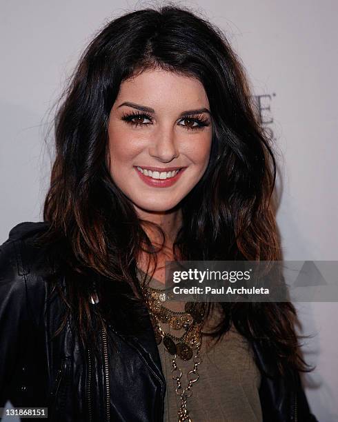 Actress Shenae Grimes arrives at the10th annual Comedy For A Cure at The Roosevelt Hotel on April 3, 2011 in Hollywood, California.