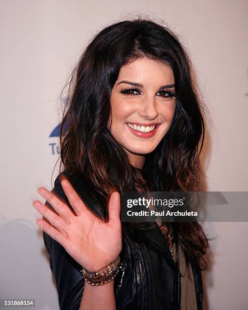 Actress Shenae Grimes arrives at the10th annual Comedy For A Cure at The Roosevelt Hotel on April 3, 2011 in Hollywood, California.