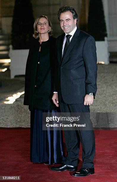 French Education Minister Luc Chatel and his wife arrives at a state dinner honouring visiting Chinese President Hu Jintao at Elysee Palace on...