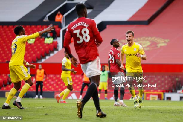 Joe Bryan of Fulham celebrates after scoring their side's first goal during the Premier League match between Manchester United and Fulham at Old...