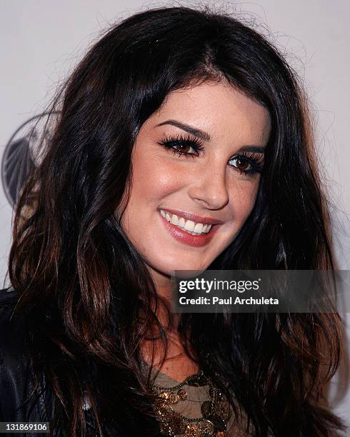 Actress Shenae Grimes arrives at the10th annual Comedy For A Cure at The Roosevelt Hotel on April 3, 2011 in Hollywood, California.