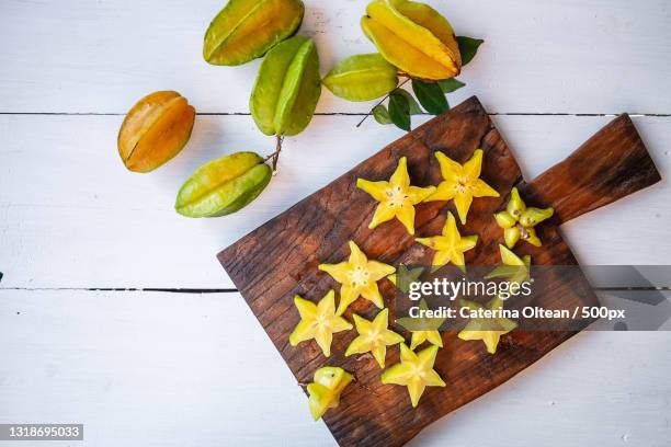 directly above shot of food on cutting board - carambola stock pictures, royalty-free photos & images