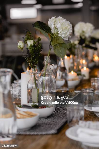 close-up of place setting on table,setia tropika,malaysia - bud vase stock pictures, royalty-free photos & images