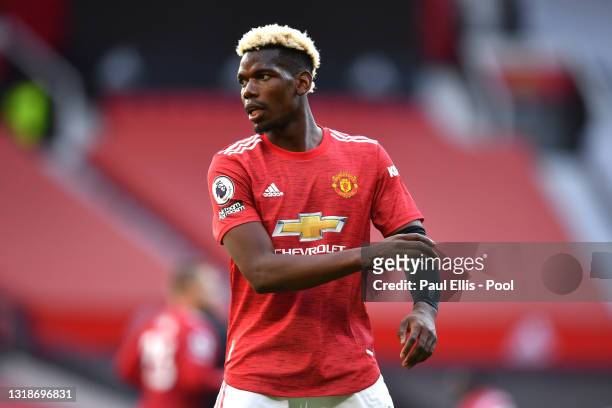 Paul Pogba of Manchester United looks on during the Premier League match between Manchester United and Fulham at Old Trafford on May 18, 2021 in...