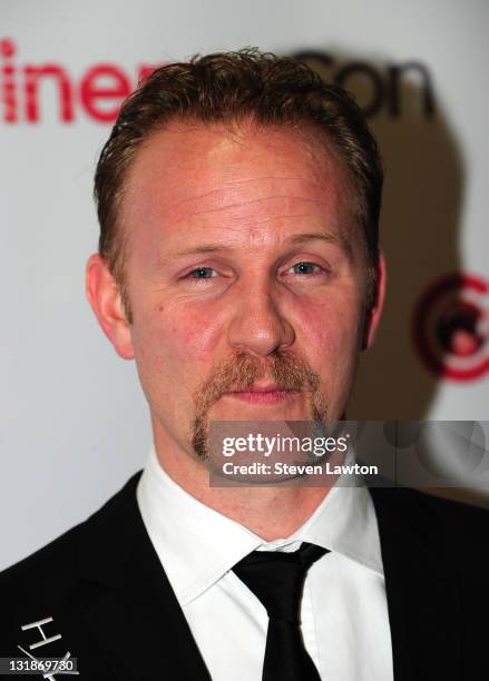 Director Morgan Spurlock poses with his Documentary Filmmaker of the Year award during CinemaCon at The Colosseum of Caesars Palace on March 30, 2011...