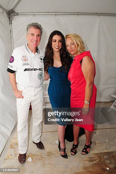 John Walsh, Meghan Walsh and Reve Walsh backstage after Meghan Walsh "Blank Silk" fashion show at the AMG Miami Beach Polo Cup VII kick off on April...