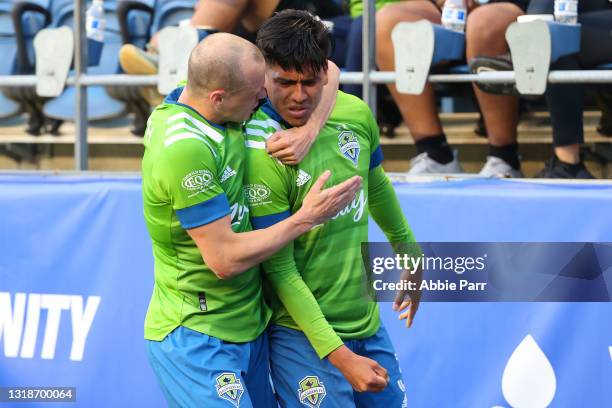Xavier Arreaga celebrates with Brad Smith of Seattle Sounders after scoring a goal in the second half to take a 1-0 lead against Los Angeles FC at...
