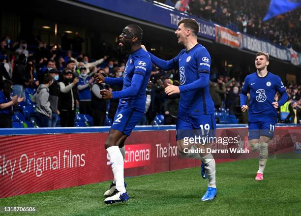 Antonio Ruediger of Chelsea celebrates after scoring their sides first goal with team mate Mason Mount during the Premier League match between...