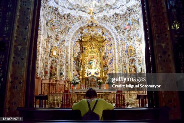 woman praying - altare stock pictures, royalty-free photos & images