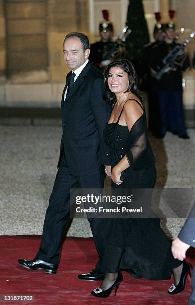 Jean-Francois Cope, President of the UMP group at the National Assembly and his wife Nadia Cope arrive at a state dinner honouring visiting Chinese...