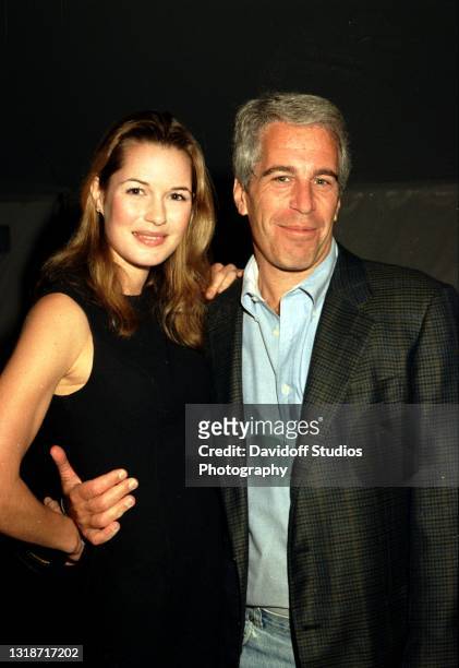 Portrait of Norwegian college student Celina Midelfart and American socialite Jeffrey Epstein as they pose together during a reception at the...