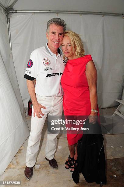 John Walsh and Reve Walsh backstage after Meghan Walsh "Blank Silk" fashion show at the AMG Miami Beach Polo Cup VII kick off on April 21, 2011 in...
