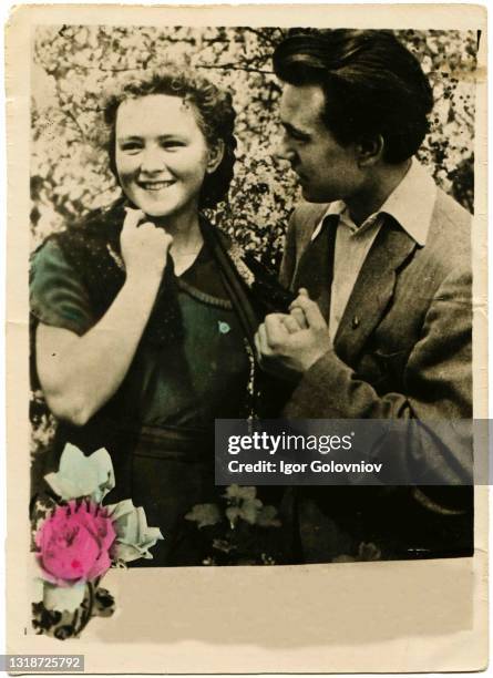 Postcard printed in the USSR shows a couple in love, circa 1950s.