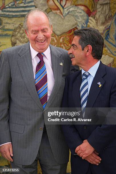 King Juan Carlos of Spain receives Cantabria Regional President Miguel Angel Revilla , member of "Colegios del Mundo Unido" Foundation at Zarzuela...