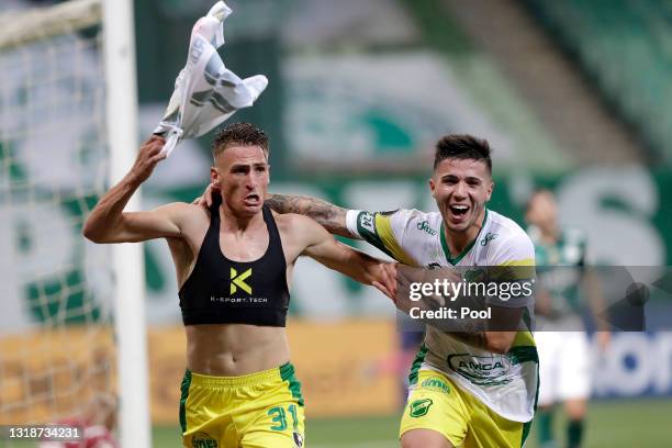 Braian Romero of Defensa y Justicia celebrates with teammate Enzo Fernandez after scoring the fourth goal of his team during a match between...