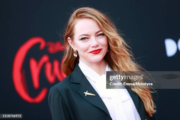 Emma Stone poses at the photocall for Louis Vuitton Cruise