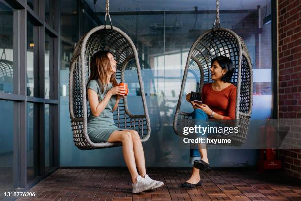 female office workers having a coffee break in office - asian coffee at cafe imagens e fotografias de stock