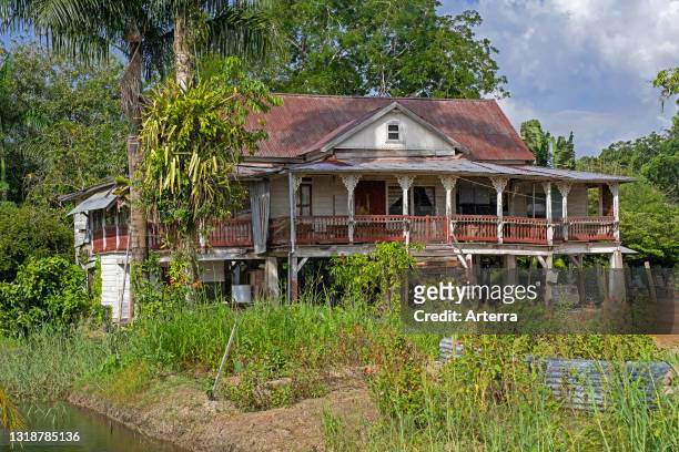 Dilapidated director's house of Peperpot, former coffee and cacao plantation in the Commewijne District in northern Suriname / Surinam.