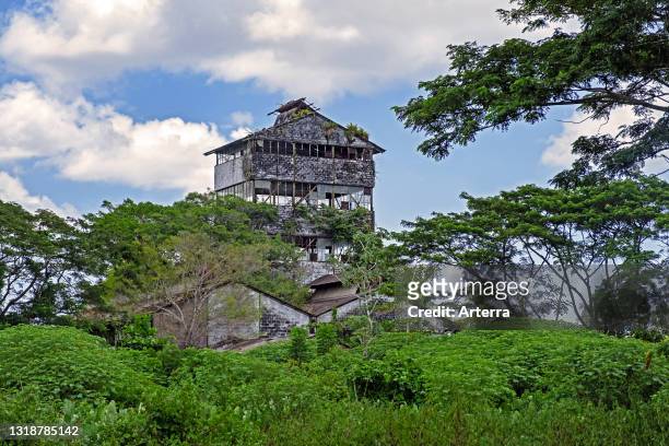Dilapidated old factory at Mariënburg, former sugarcane plantation and village in the Commewijne District in northern Suriname / Surinam.