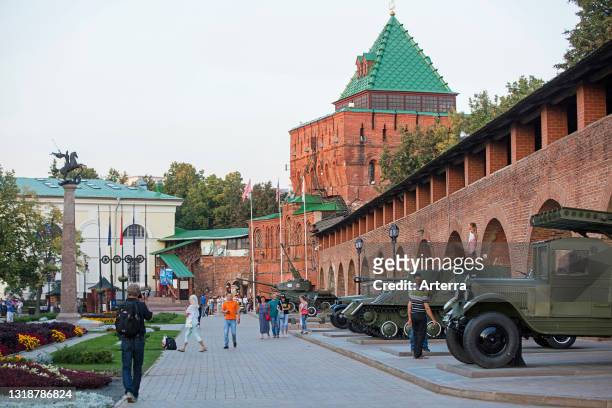 Dmitrievskaya Tower, main tower on the southern wall and display of armoured vehicles in the Nizhny Novgorod Kremlin, Russia.