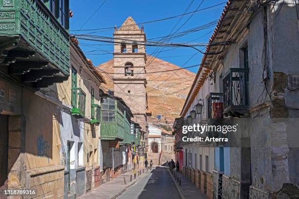 Street with colonial houses and bell tower of the San Francisco of Potosi Temple and Convent in the city Potosi, Tomás Frías Province, Bolivia.