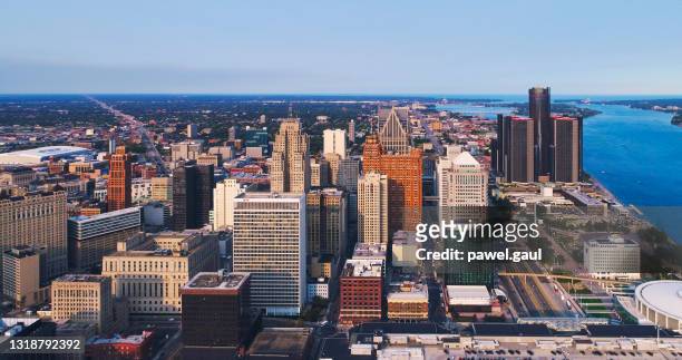 detroit michigan downtown skyline aerial sunset - detroit michigan stock pictures, royalty-free photos & images