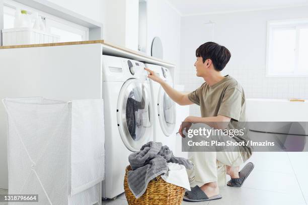 Pushing Washing Washing Machine Shoot Photos and Premium High Res Pictures - Getty Images